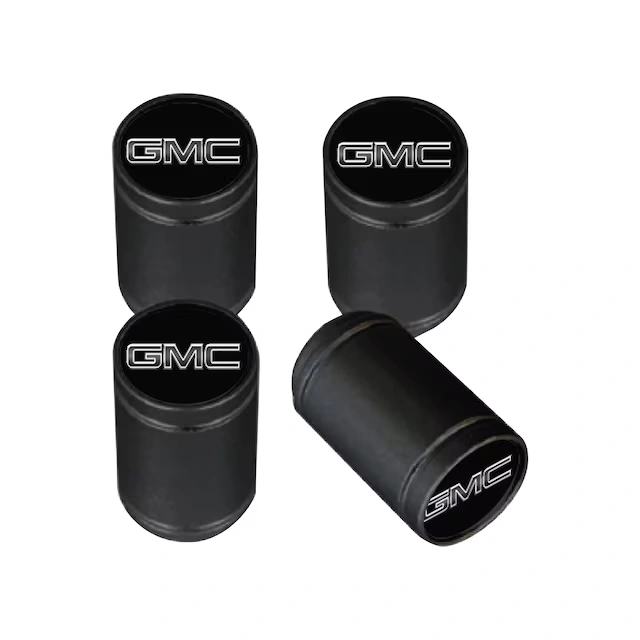 Wide Bottom License Plate Frame in Black Powder Coated Zinc with GMC Logo and Valve Stem Caps by Baron & Baron® - Associated Accessories